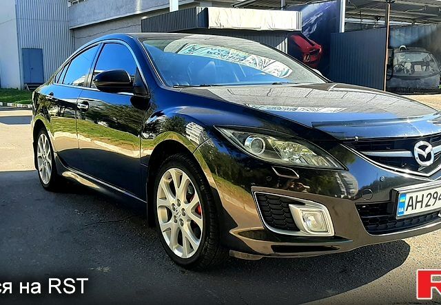Черный Мазда 6, объемом двигателя 2.5 л и пробегом 200 тыс. км за 8300 $, фото 1 на Automoto.ua