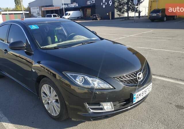 Черный Мазда 6, объемом двигателя 2 л и пробегом 180 тыс. км за 8000 $, фото 1 на Automoto.ua