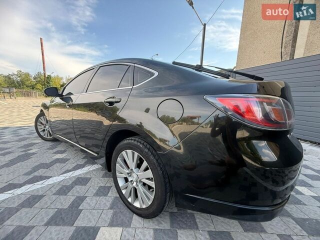 Черный Мазда 6, объемом двигателя 2 л и пробегом 331 тыс. км за 5200 $, фото 1 на Automoto.ua
