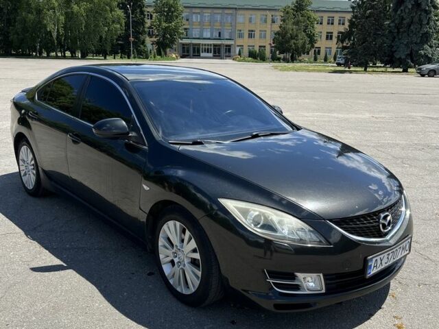 Черный Мазда 6, объемом двигателя 2 л и пробегом 290 тыс. км за 5999 $, фото 1 на Automoto.ua
