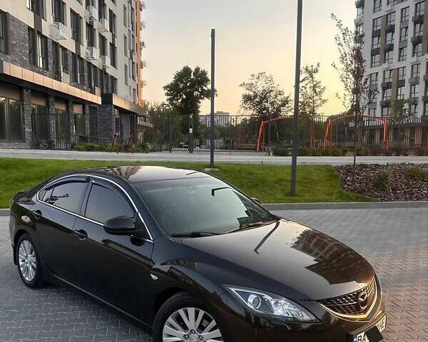Черный Мазда 6, объемом двигателя 2 л и пробегом 248 тыс. км за 8899 $, фото 1 на Automoto.ua
