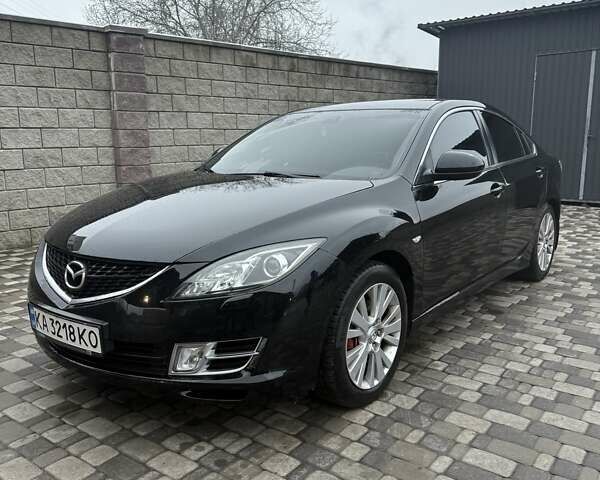 Черный Мазда 6, объемом двигателя 2 л и пробегом 280 тыс. км за 6500 $, фото 1 на Automoto.ua
