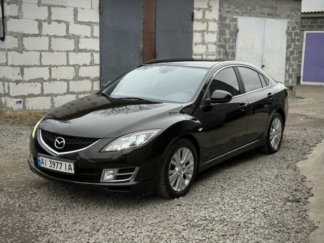 Черный Мазда 6, объемом двигателя 2 л и пробегом 263 тыс. км за 5850 $, фото 1 на Automoto.ua