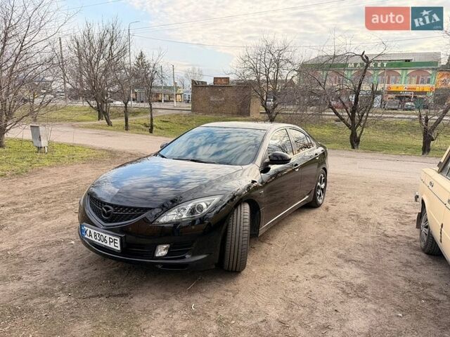 Черный Мазда 6, объемом двигателя 2.49 л и пробегом 215 тыс. км за 8200 $, фото 1 на Automoto.ua