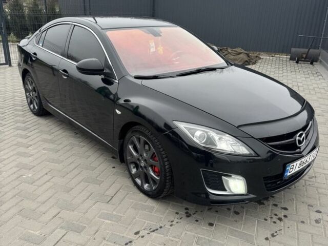 Черный Мазда 6, объемом двигателя 2.5 л и пробегом 303 тыс. км за 7100 $, фото 1 на Automoto.ua