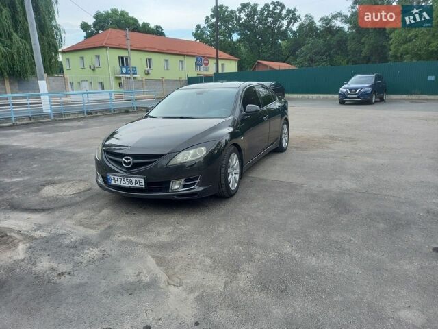 Черный Мазда 6, объемом двигателя 2 л и пробегом 268 тыс. км за 5999 $, фото 1 на Automoto.ua