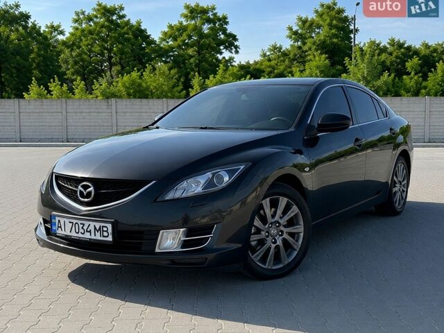 Чорний Мазда 6, об'ємом двигуна 2 л та пробігом 266 тис. км за 7599 $, фото 1 на Automoto.ua