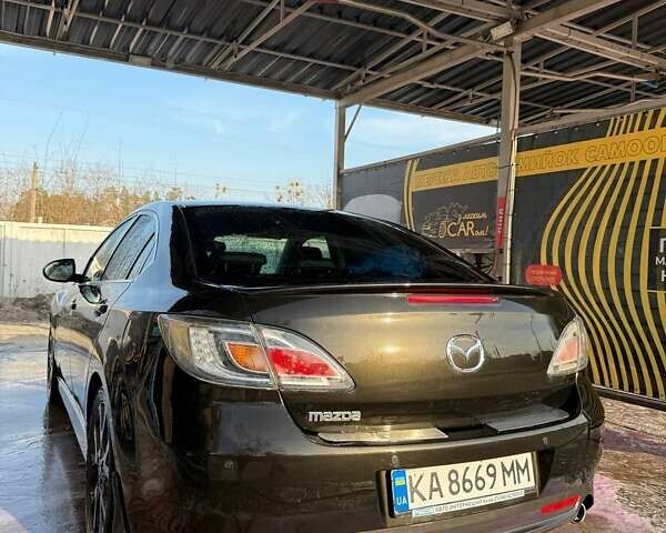 Черный Мазда 6, объемом двигателя 2.5 л и пробегом 256 тыс. км за 6900 $, фото 1 на Automoto.ua