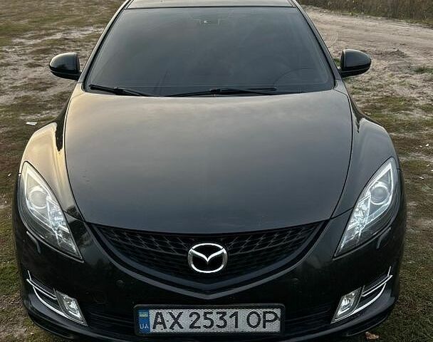 Черный Мазда 6, объемом двигателя 2.49 л и пробегом 257 тыс. км за 6900 $, фото 1 на Automoto.ua