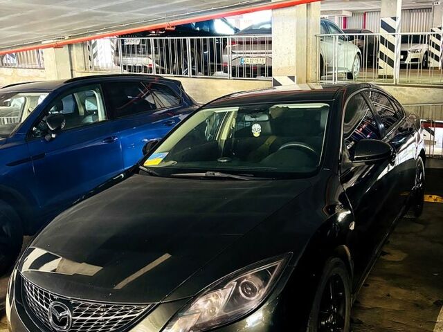Черный Мазда 6, объемом двигателя 2 л и пробегом 302 тыс. км за 6900 $, фото 1 на Automoto.ua