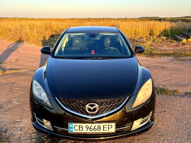 Черный Мазда 6, объемом двигателя 1.8 л и пробегом 195 тыс. км за 6800 $, фото 1 на Automoto.ua
