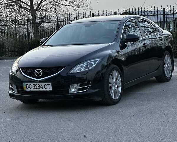 Черный Мазда 6, объемом двигателя 1.8 л и пробегом 135 тыс. км за 7400 $, фото 1 на Automoto.ua