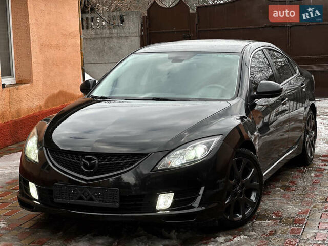 Черный Мазда 6, объемом двигателя 2.5 л и пробегом 259 тыс. км за 6200 $, фото 1 на Automoto.ua