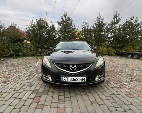 Черный Мазда 6, объемом двигателя 2 л и пробегом 174 тыс. км за 6600 $, фото 1 на Automoto.ua