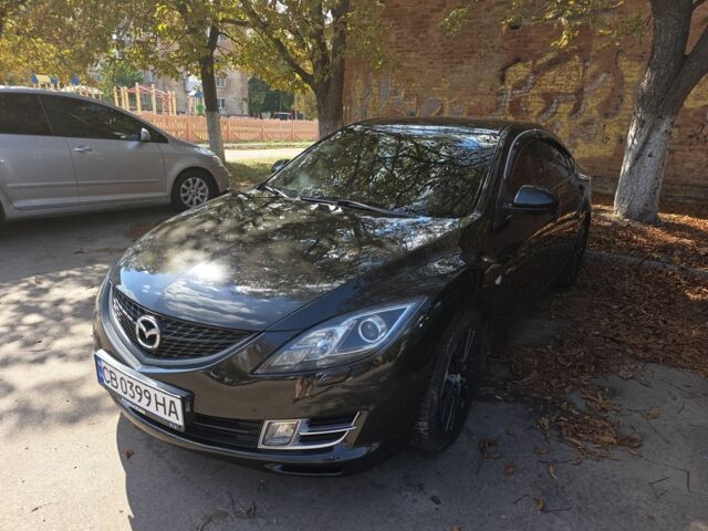 Черный Мазда 6, объемом двигателя 2 л и пробегом 220 тыс. км за 8309 $, фото 1 на Automoto.ua