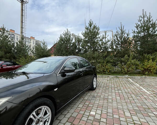 Черный Мазда 6, объемом двигателя 2 л и пробегом 174 тыс. км за 6800 $, фото 1 на Automoto.ua