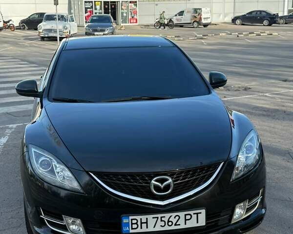 Черный Мазда 6, объемом двигателя 2 л и пробегом 179 тыс. км за 7700 $, фото 1 на Automoto.ua
