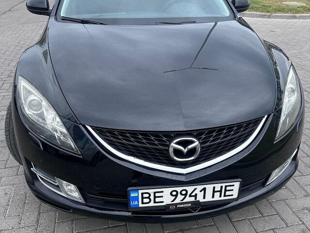 Черный Мазда 6, объемом двигателя 1.8 л и пробегом 190 тыс. км за 6400 $, фото 1 на Automoto.ua