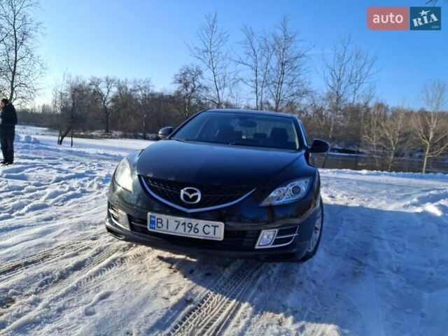 Черный Мазда 6, объемом двигателя 1.8 л и пробегом 137 тыс. км за 5600 $, фото 1 на Automoto.ua