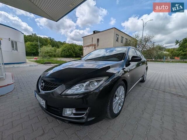 Черный Мазда 6, объемом двигателя 2.18 л и пробегом 290 тыс. км за 6350 $, фото 1 на Automoto.ua