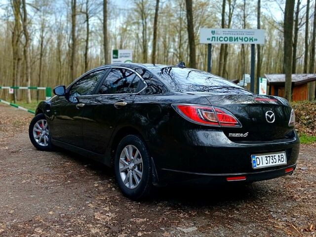 Черный Мазда 6, объемом двигателя 1.8 л и пробегом 196 тыс. км за 6500 $, фото 1 на Automoto.ua