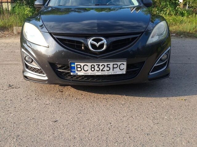 Черный Мазда 6, объемом двигателя 2.49 л и пробегом 180 тыс. км за 9000 $, фото 1 на Automoto.ua