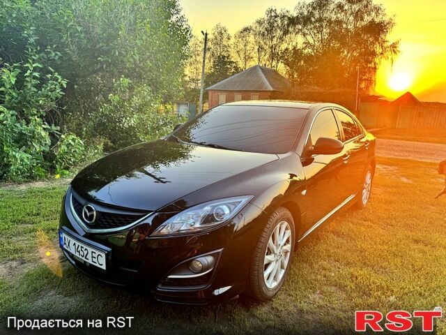 Черный Мазда 6, объемом двигателя 2 л и пробегом 191 тыс. км за 7700 $, фото 1 на Automoto.ua