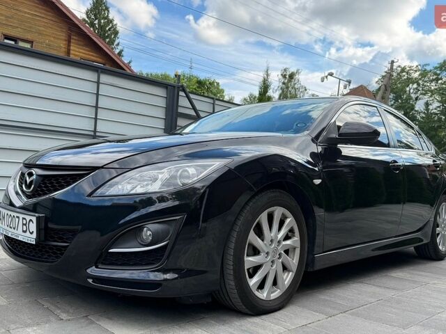 Черный Мазда 6, объемом двигателя 2 л и пробегом 141 тыс. км за 7300 $, фото 1 на Automoto.ua