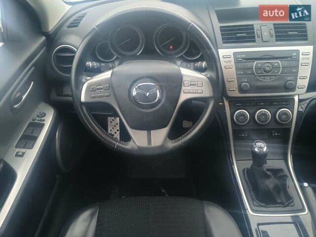 Черный Мазда 6, объемом двигателя 2 л и пробегом 173 тыс. км за 8500 $, фото 1 на Automoto.ua