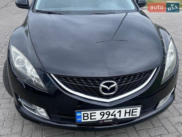 Черный Мазда 6, объемом двигателя 1.8 л и пробегом 190 тыс. км за 6400 $, фото 1 на Automoto.ua