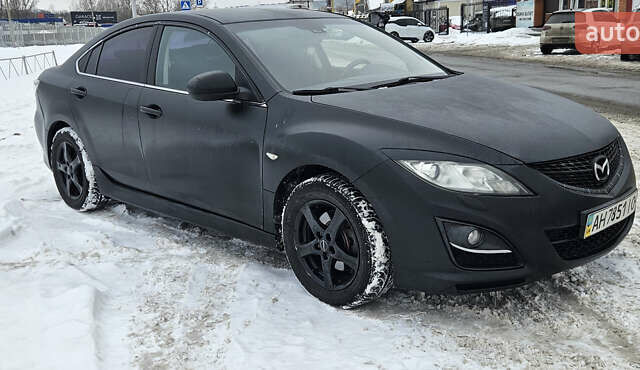Черный Мазда 6, объемом двигателя 1.8 л и пробегом 168 тыс. км за 5800 $, фото 1 на Automoto.ua