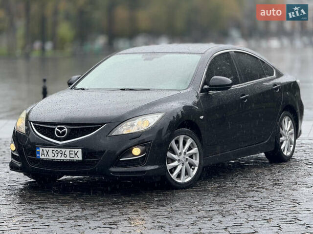 Черный Мазда 6, объемом двигателя 2 л и пробегом 169 тыс. км за 7990 $, фото 1 на Automoto.ua
