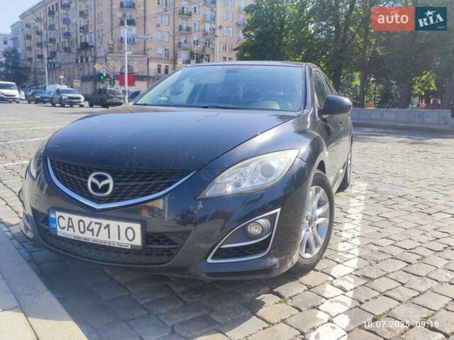 Черный Мазда 6, объемом двигателя 1.8 л и пробегом 238 тыс. км за 6400 $, фото 1 на Automoto.ua