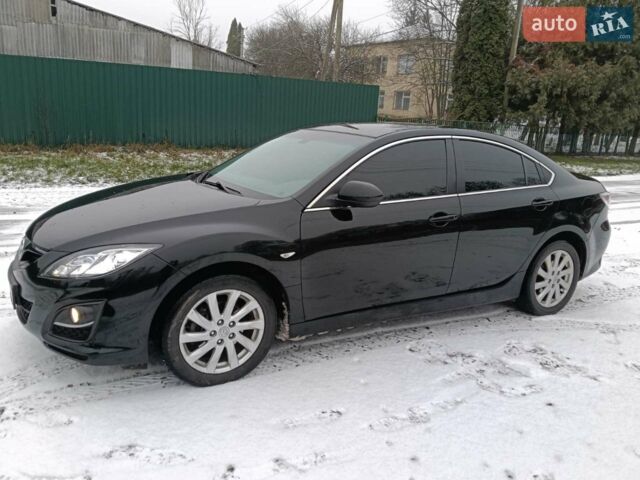 Черный Мазда 6, объемом двигателя 2 л и пробегом 180 тыс. км за 7700 $, фото 1 на Automoto.ua