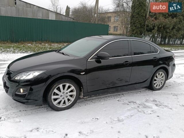 Черный Мазда 6, объемом двигателя 2 л и пробегом 180 тыс. км за 7700 $, фото 1 на Automoto.ua