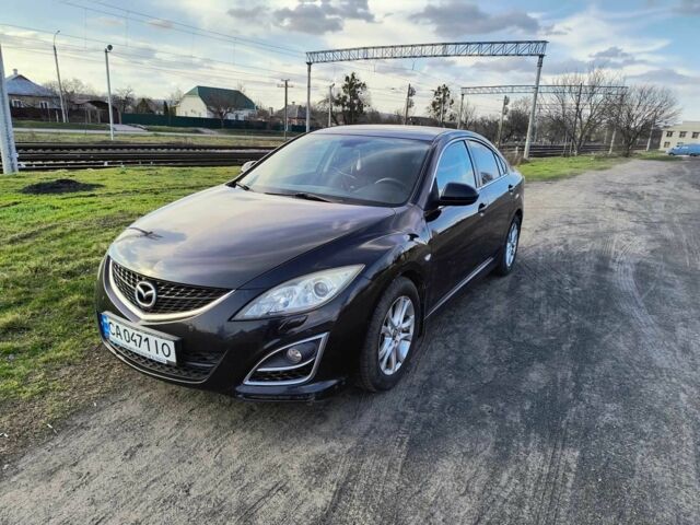 Чорний Мазда 6, об'ємом двигуна 1.8 л та пробігом 245 тис. км за 5900 $, фото 1 на Automoto.ua