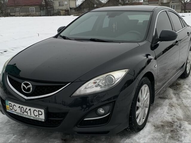 Черный Мазда 6, объемом двигателя 2 л и пробегом 220 тыс. км за 7885 $, фото 1 на Automoto.ua