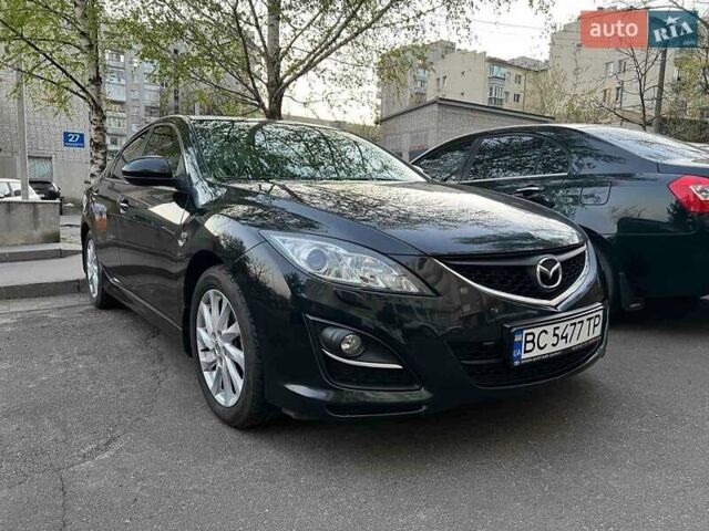 Черный Мазда 6, объемом двигателя 1.8 л и пробегом 92 тыс. км за 7900 $, фото 1 на Automoto.ua