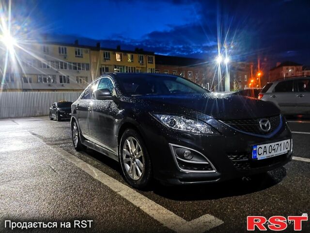 Черный Мазда 6, объемом двигателя 1.8 л и пробегом 223 тыс. км за 7700 $, фото 1 на Automoto.ua