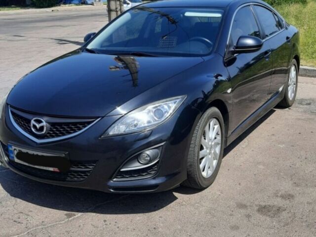 Черный Мазда 6, объемом двигателя 1.8 л и пробегом 165 тыс. км за 8000 $, фото 1 на Automoto.ua