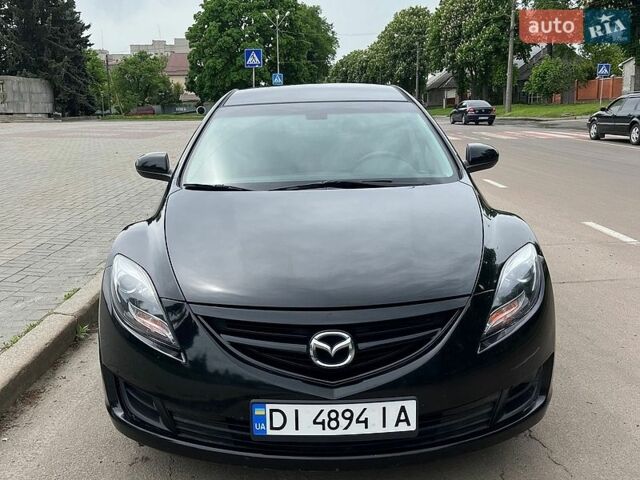 Черный Мазда 6, объемом двигателя 2.49 л и пробегом 250 тыс. км за 6900 $, фото 1 на Automoto.ua
