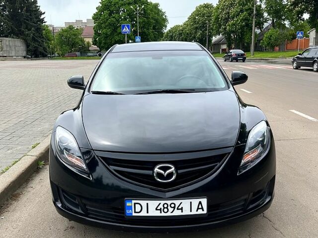 Черный Мазда 6, объемом двигателя 2.5 л и пробегом 250 тыс. км за 6600 $, фото 1 на Automoto.ua