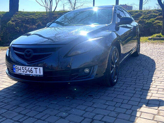 Черный Мазда 6, объемом двигателя 2.5 л и пробегом 210 тыс. км за 7900 $, фото 1 на Automoto.ua