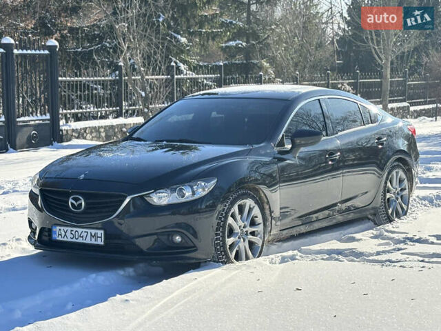 Черный Мазда 6, объемом двигателя 2.49 л и пробегом 230 тыс. км за 9400 $, фото 1 на Automoto.ua