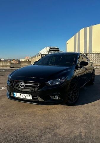 Черный Мазда 6, объемом двигателя 2.49 л и пробегом 163 тыс. км за 11700 $, фото 1 на Automoto.ua