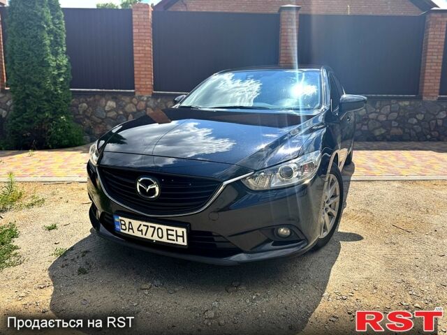 Чорний Мазда 6, об'ємом двигуна 2 л та пробігом 200 тис. км за 10999 $, фото 1 на Automoto.ua