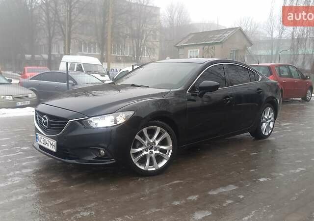 Черный Мазда 6, объемом двигателя 2.49 л и пробегом 230 тыс. км за 8900 $, фото 1 на Automoto.ua