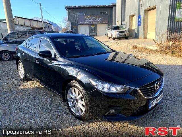 Черный Мазда 6, объемом двигателя 2 л и пробегом 113 тыс. км за 13000 $, фото 1 на Automoto.ua