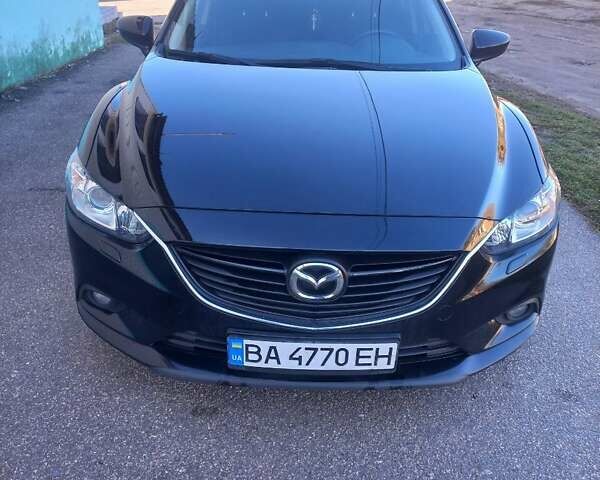 Черный Мазда 6, объемом двигателя 2 л и пробегом 198 тыс. км за 11000 $, фото 1 на Automoto.ua