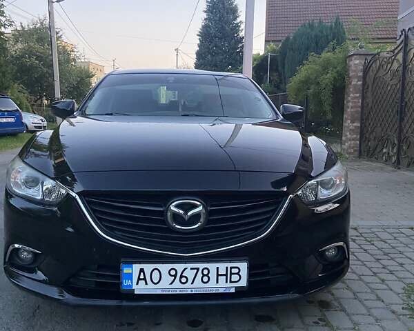 Черный Мазда 6, объемом двигателя 2 л и пробегом 118 тыс. км за 11500 $, фото 1 на Automoto.ua